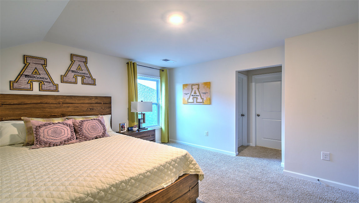 Bedroom with large windows
