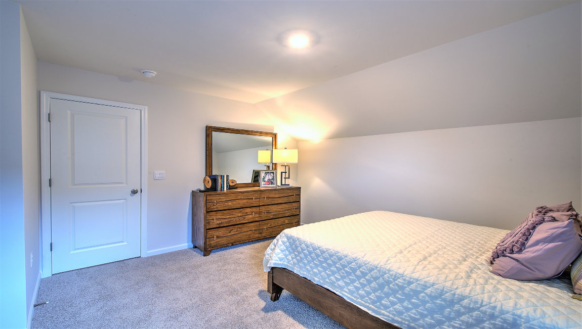 Bedroom with large windows