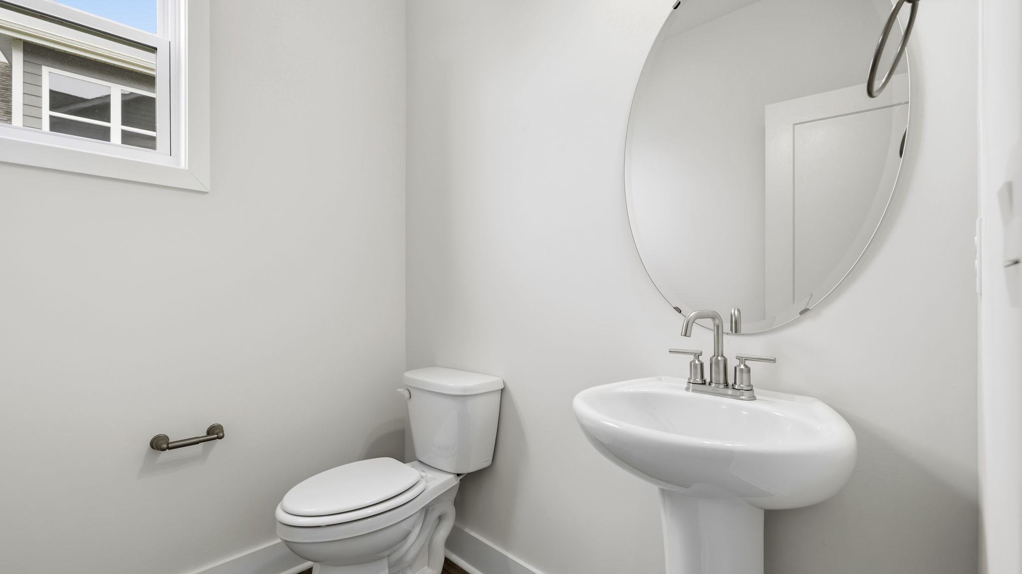 Powder room with single sink and mirror