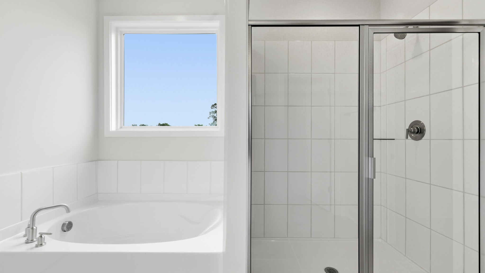 Primary bathroom with garden tub and walk in shower