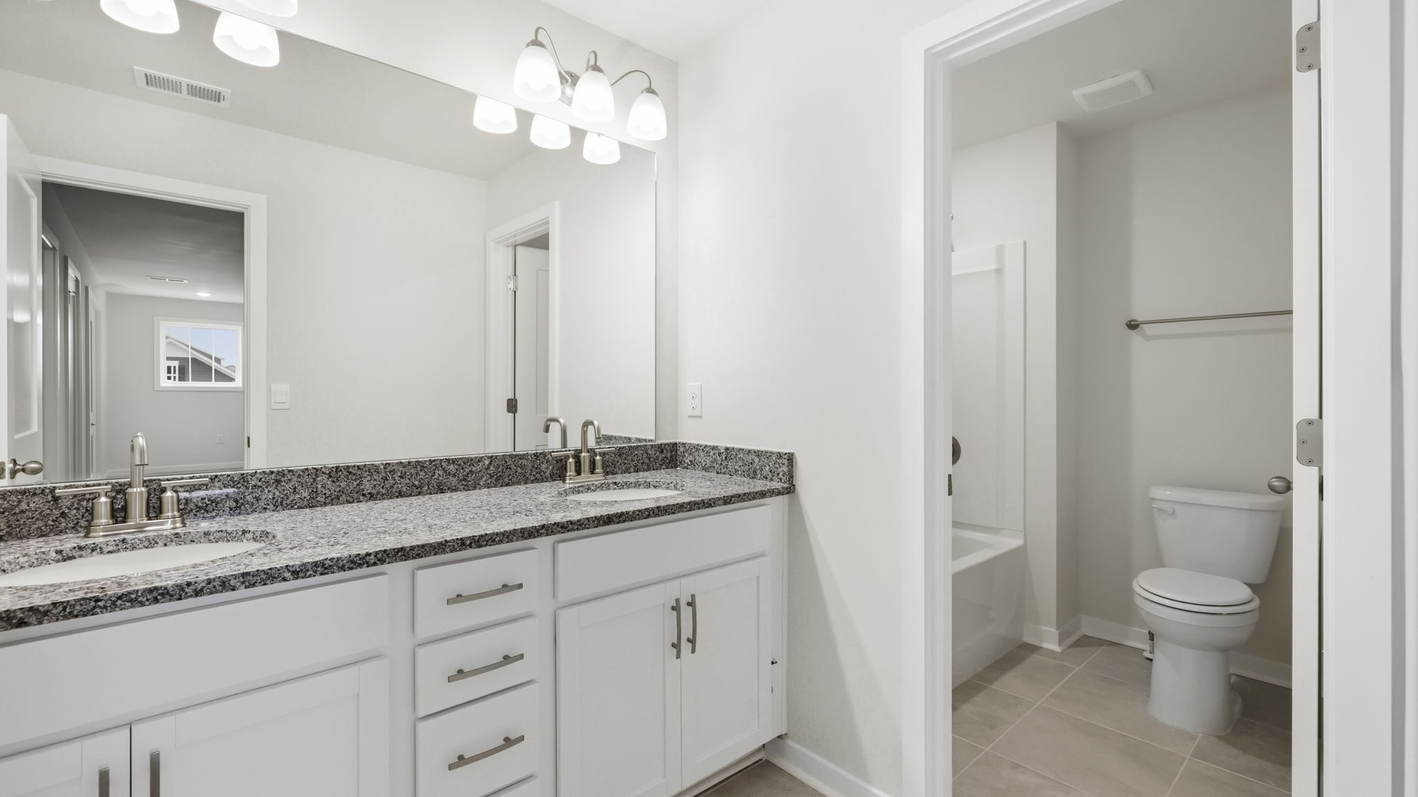 Bathroom with dual vanity