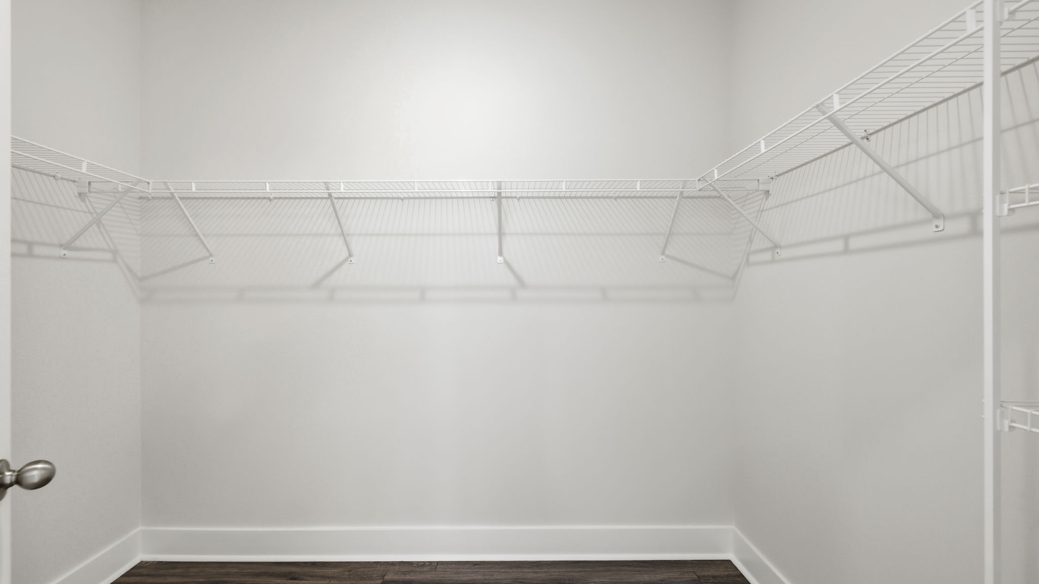 Walk in closet with shelving