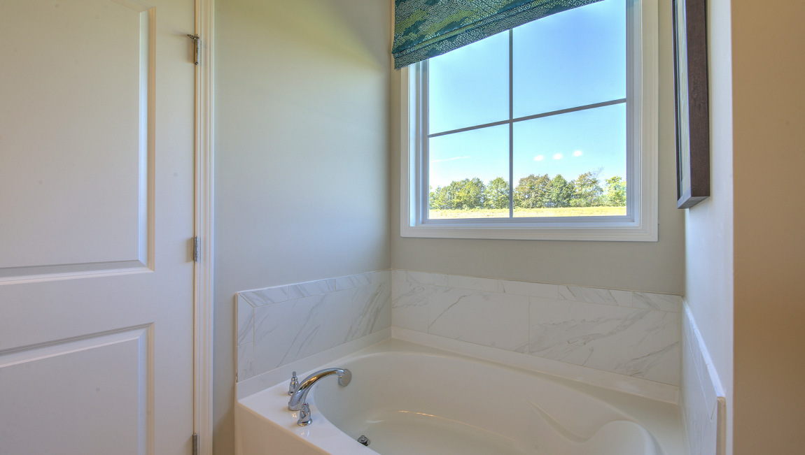 Primary bathroom with bathtub