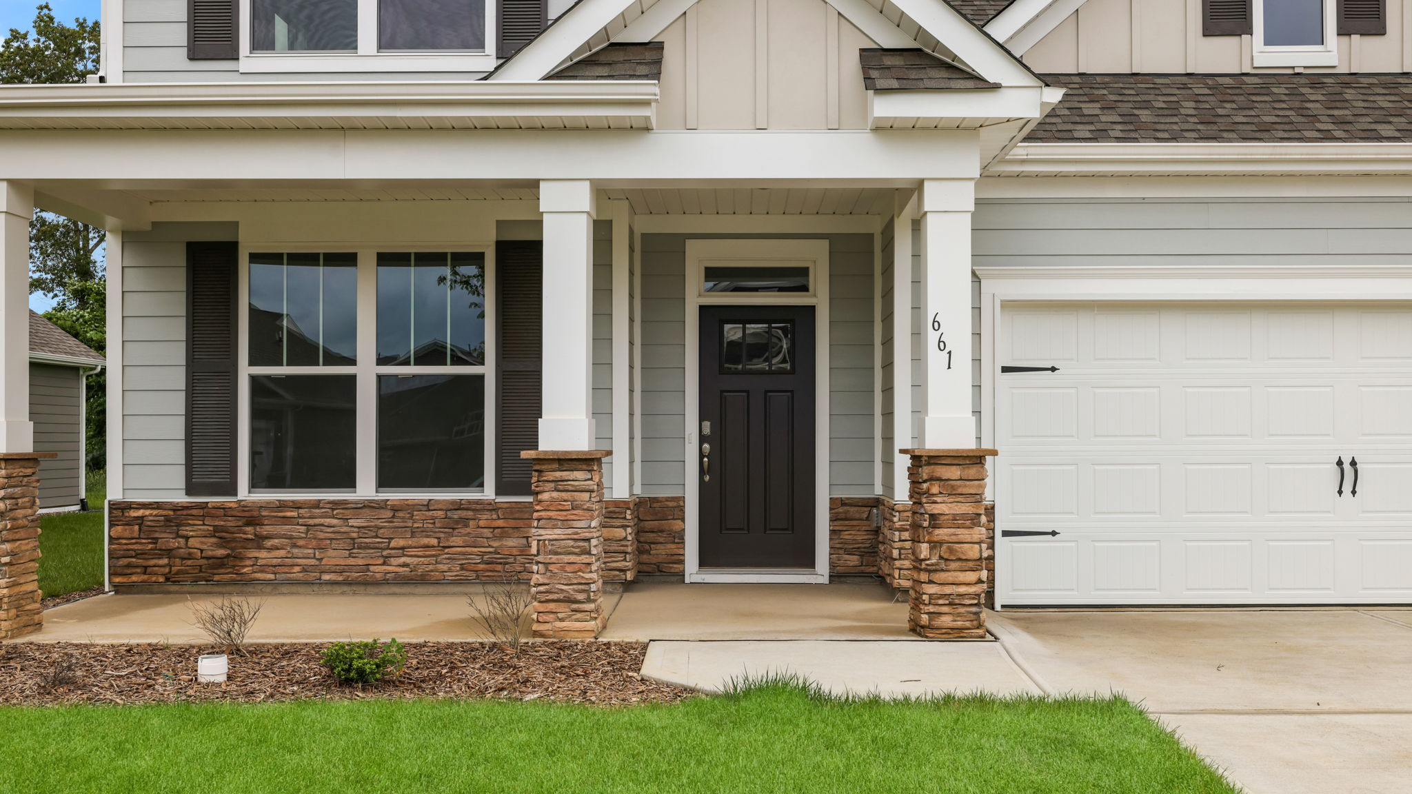 Close up exterior view of front door on the Windsor floorplan