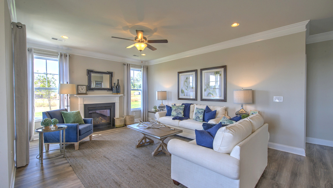 Open family room with large windows and fire place