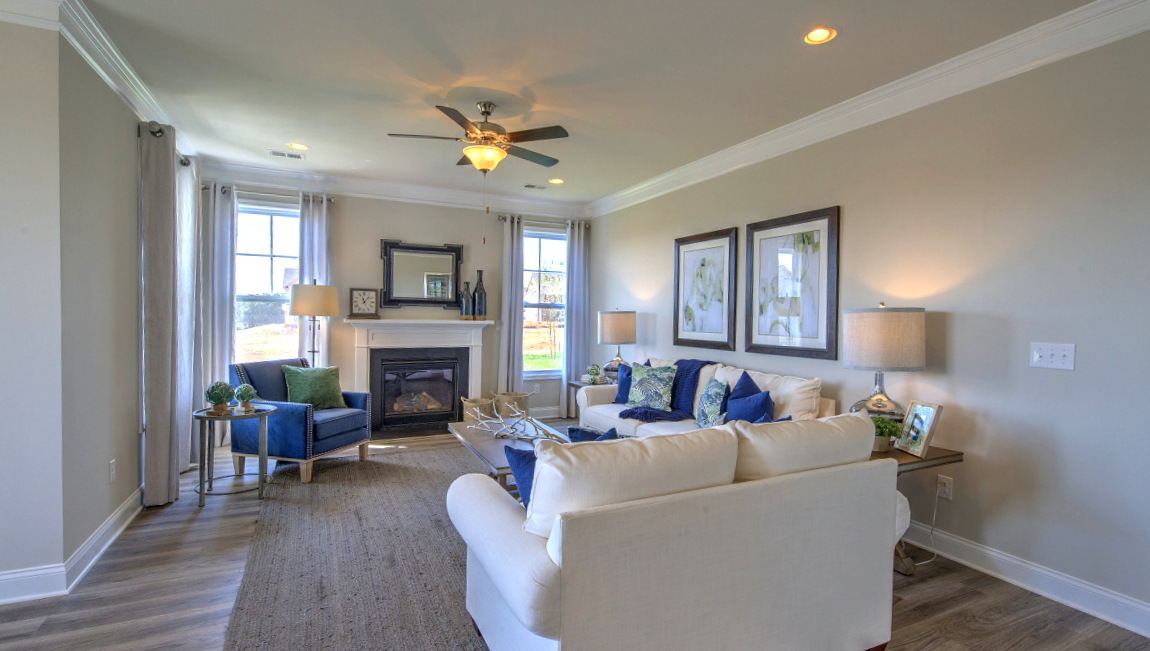 Open family room with large windows and fire place