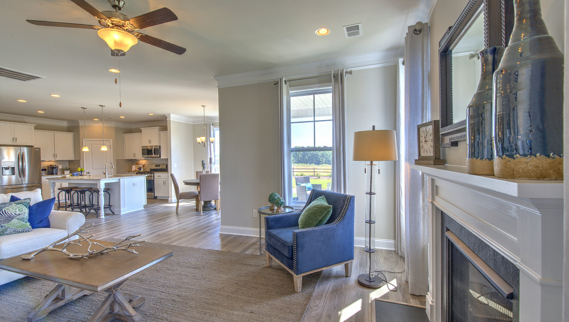Open family room with large windows and fire place