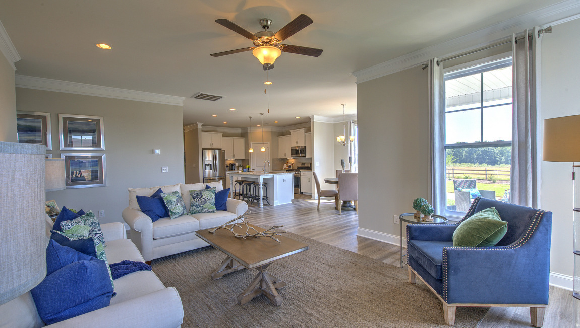 Open family room with large windows and fire place