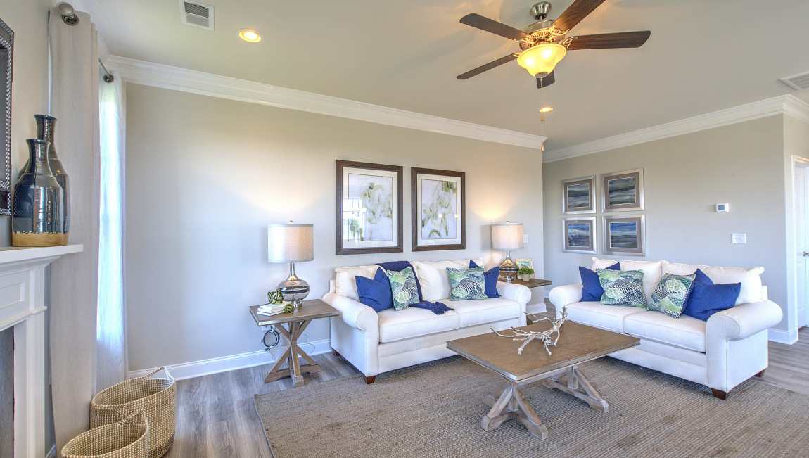 Open family room with large windows and fire place