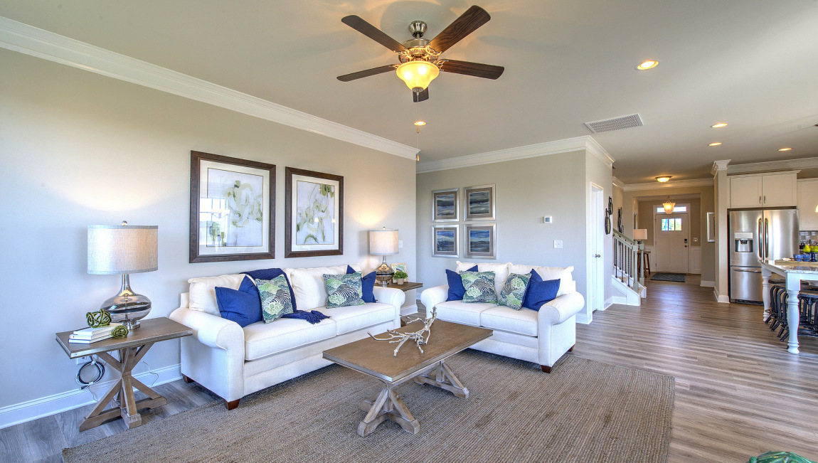 Open family room with large windows and fire place