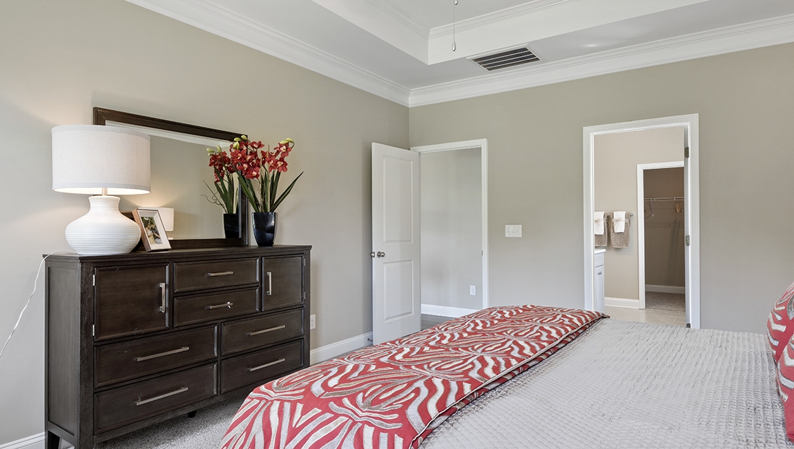 Primary bedroom with an ensuite bathroom.