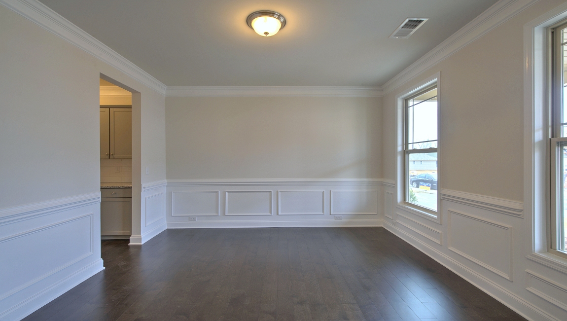 Formal dining room with windows