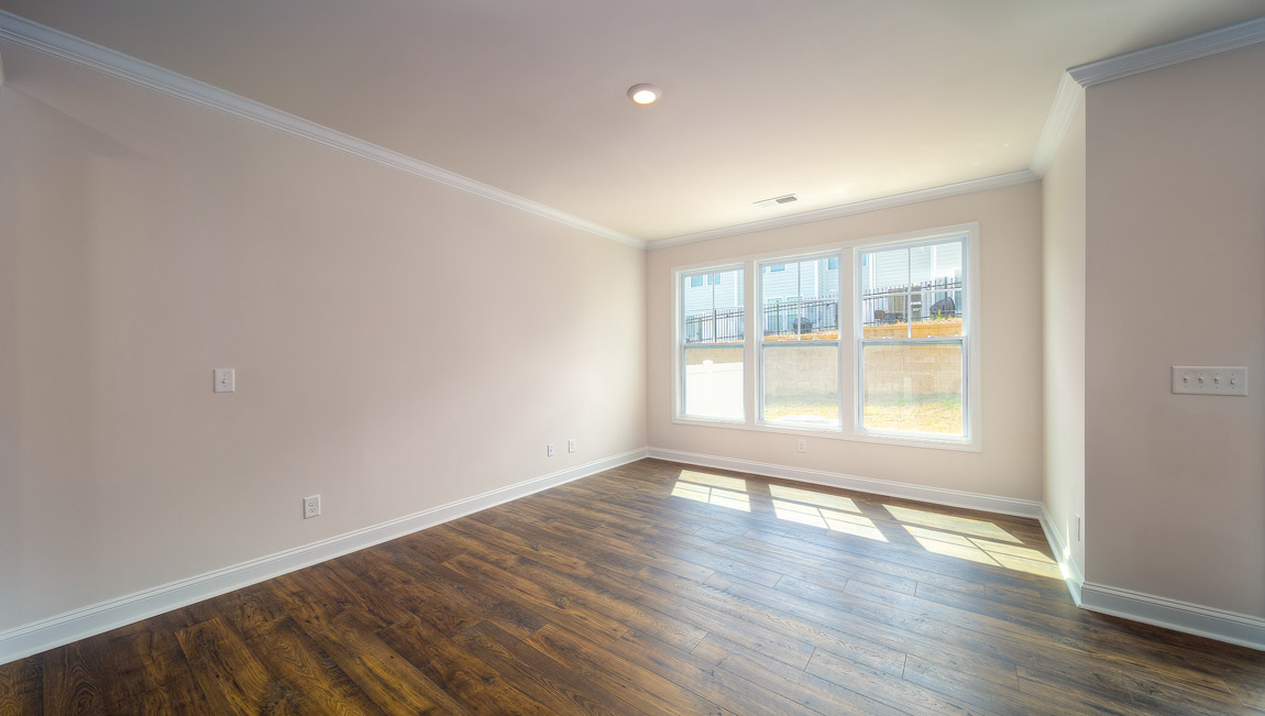 Open family room with large windows