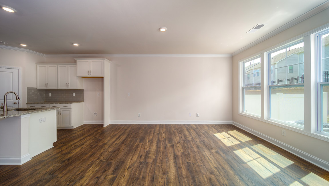 Open family room with large windows