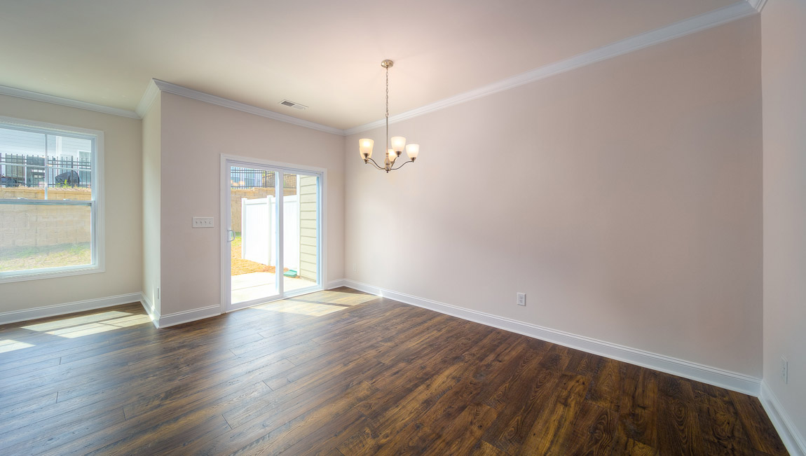 Open dining area with sliding glass doors