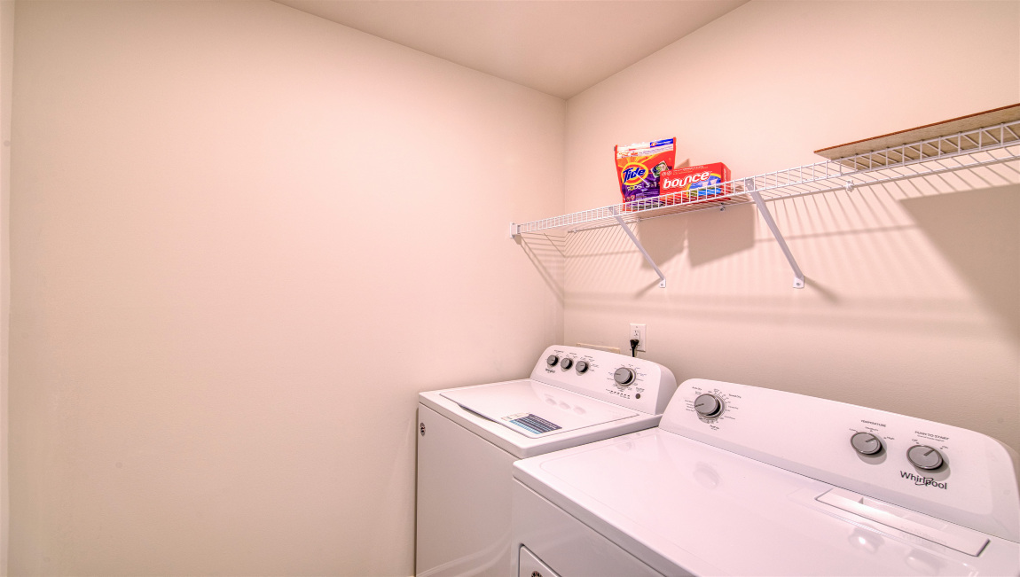 Laundry room with washer and dryer