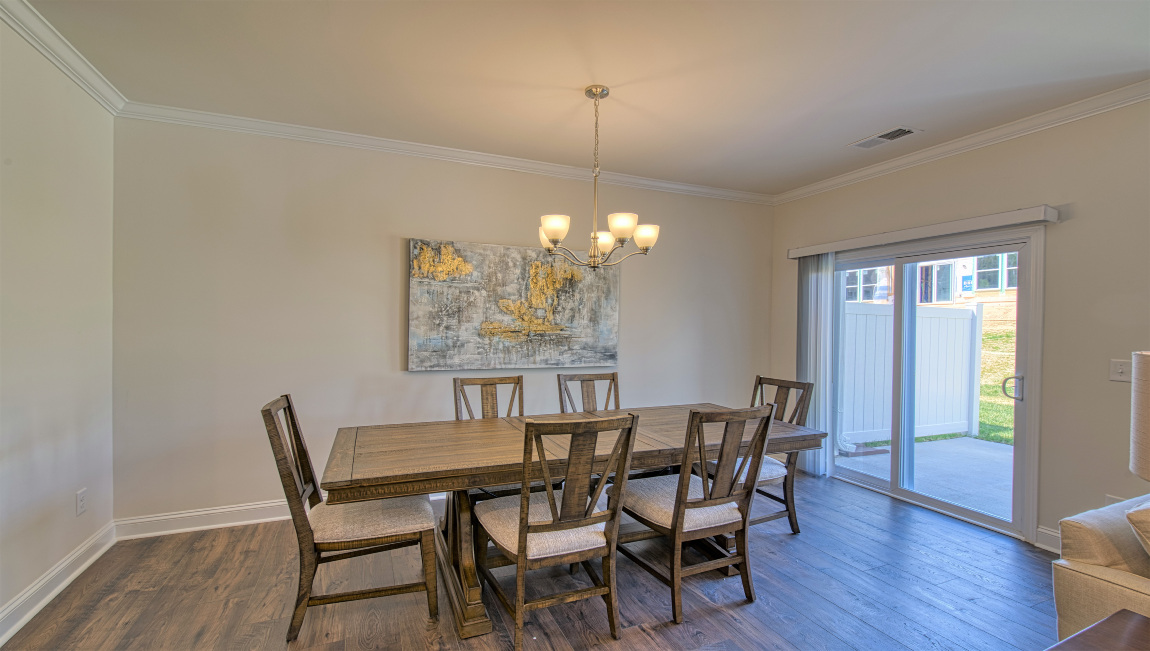 Open dining area with sliding glass doors
