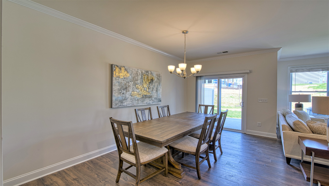 Open dining area with sliding glass doors