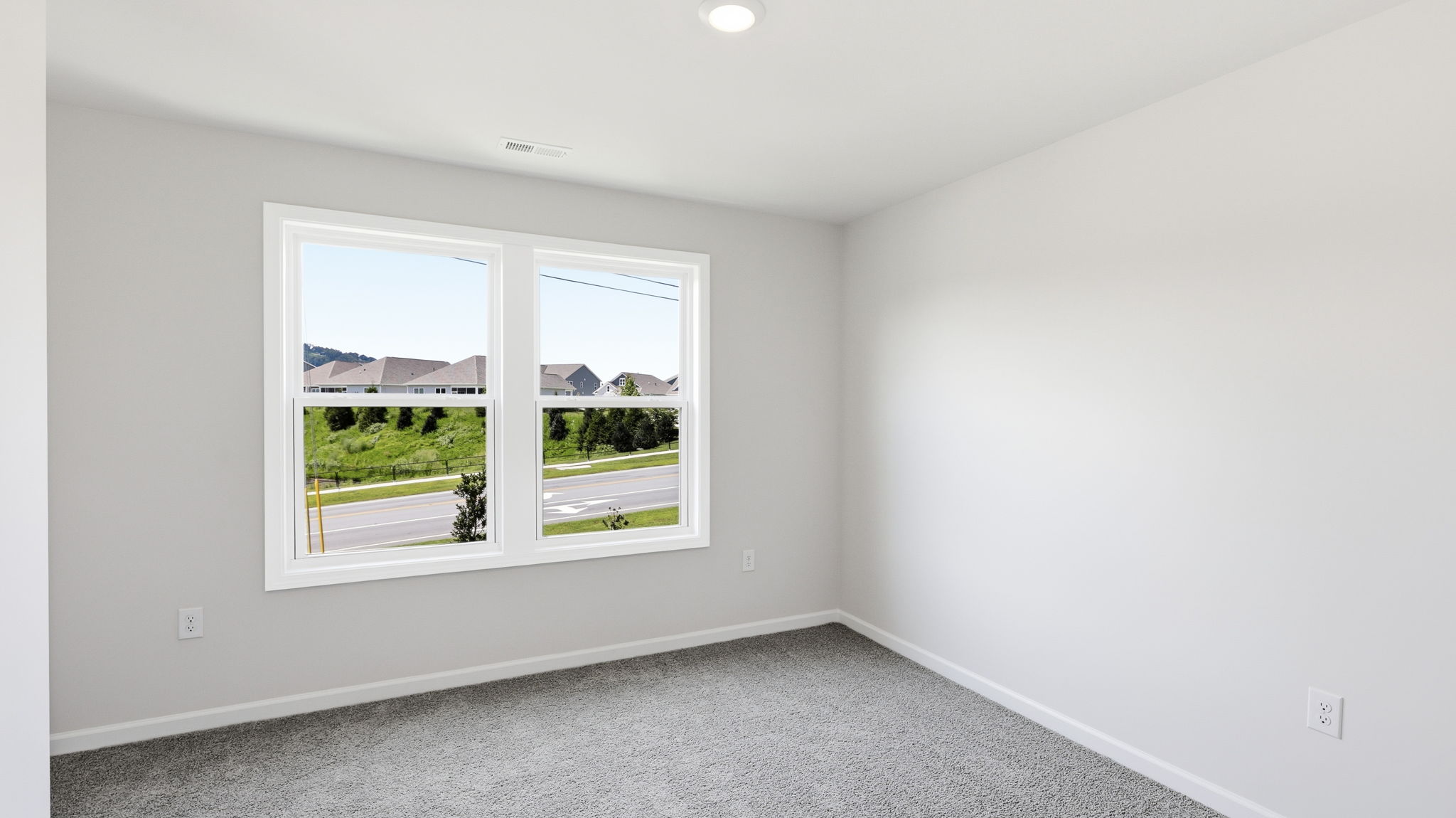 Bedroom with large windows