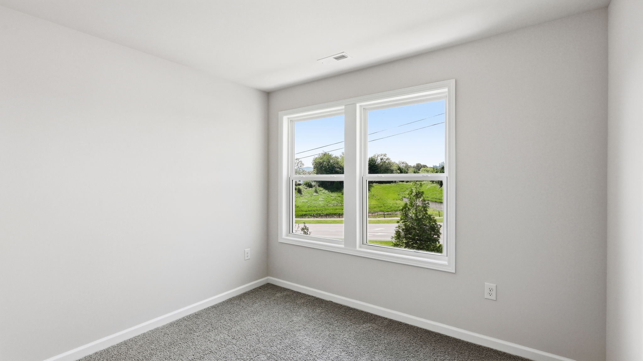 Bedroom with large windows