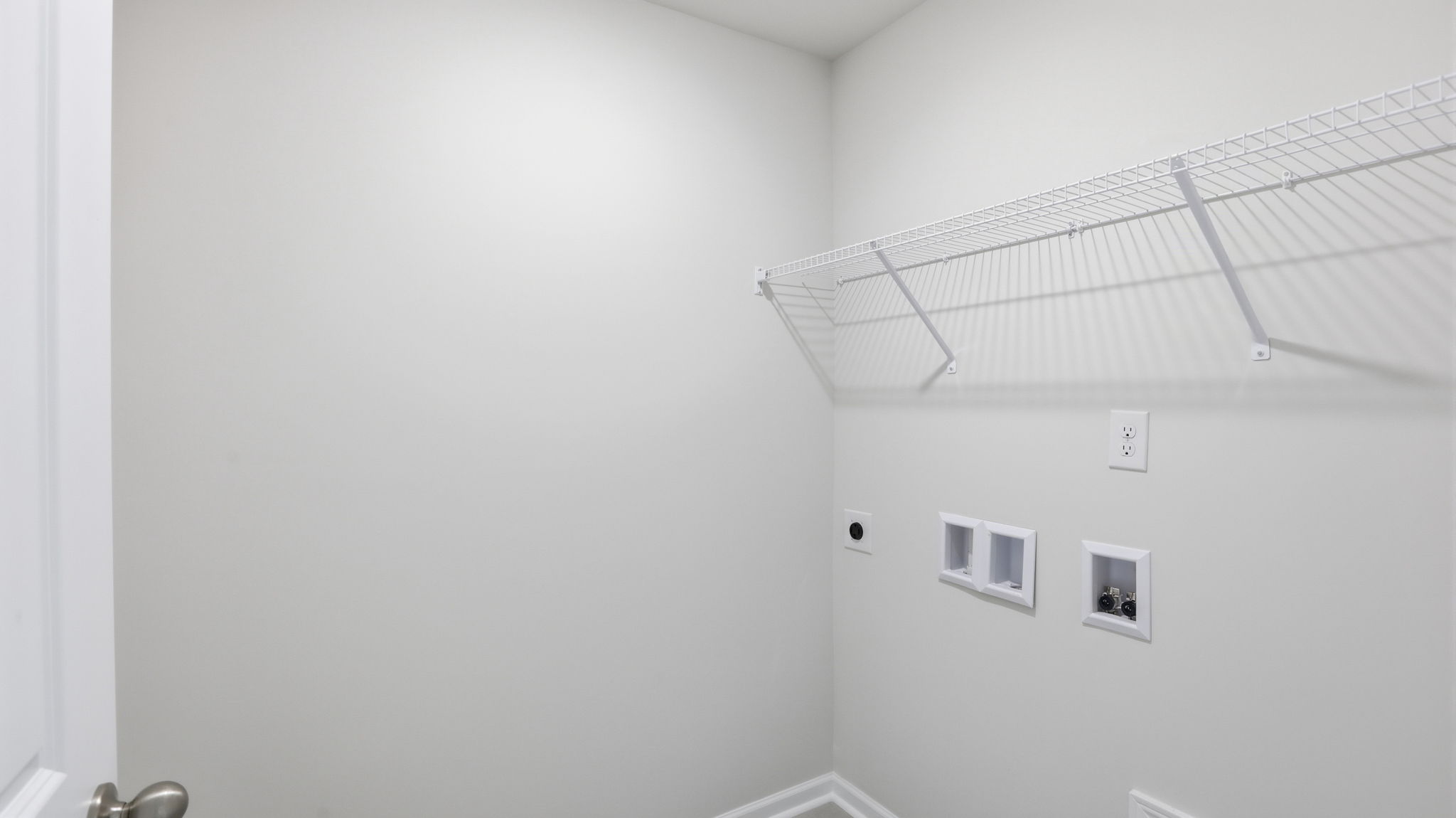 Laundry room with built in shelving