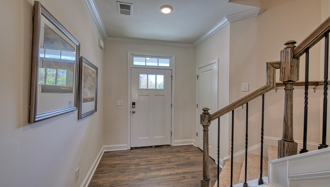 Welcoming foyer with view of the stairs