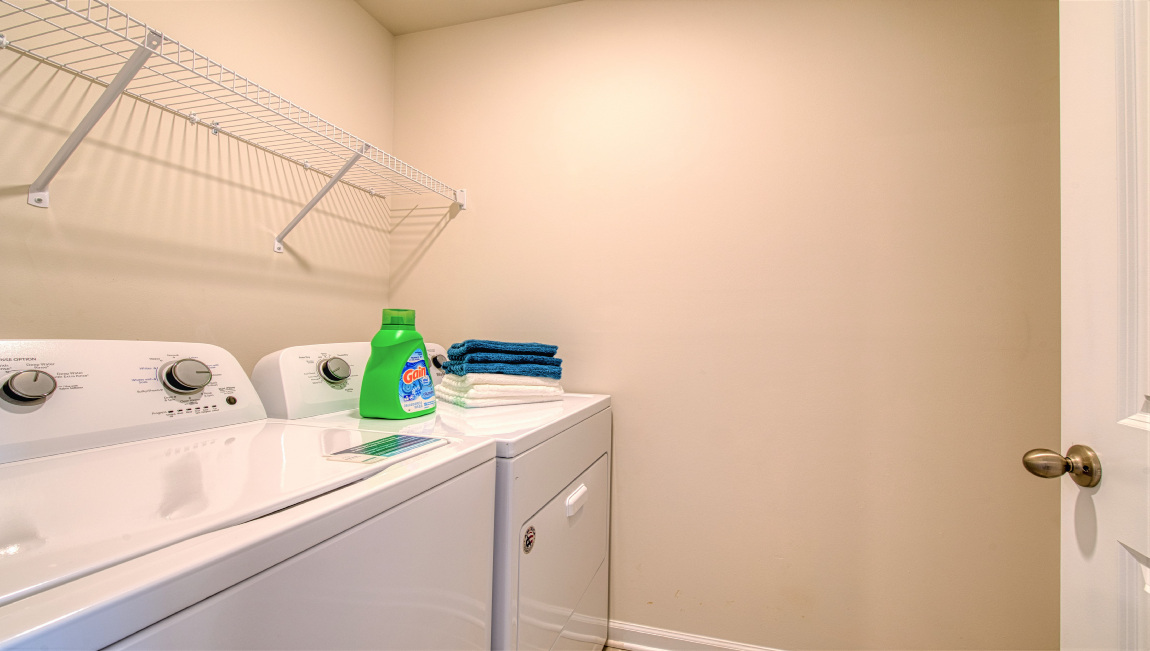 Laundry room with washer and dryer