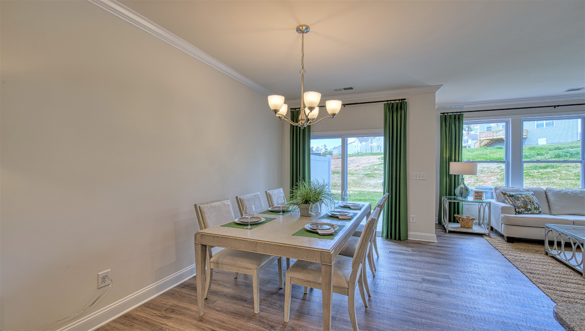 Open dining area with sliding glass doors