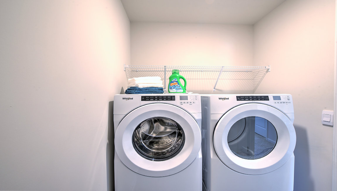 Laundry room with washer and dryer