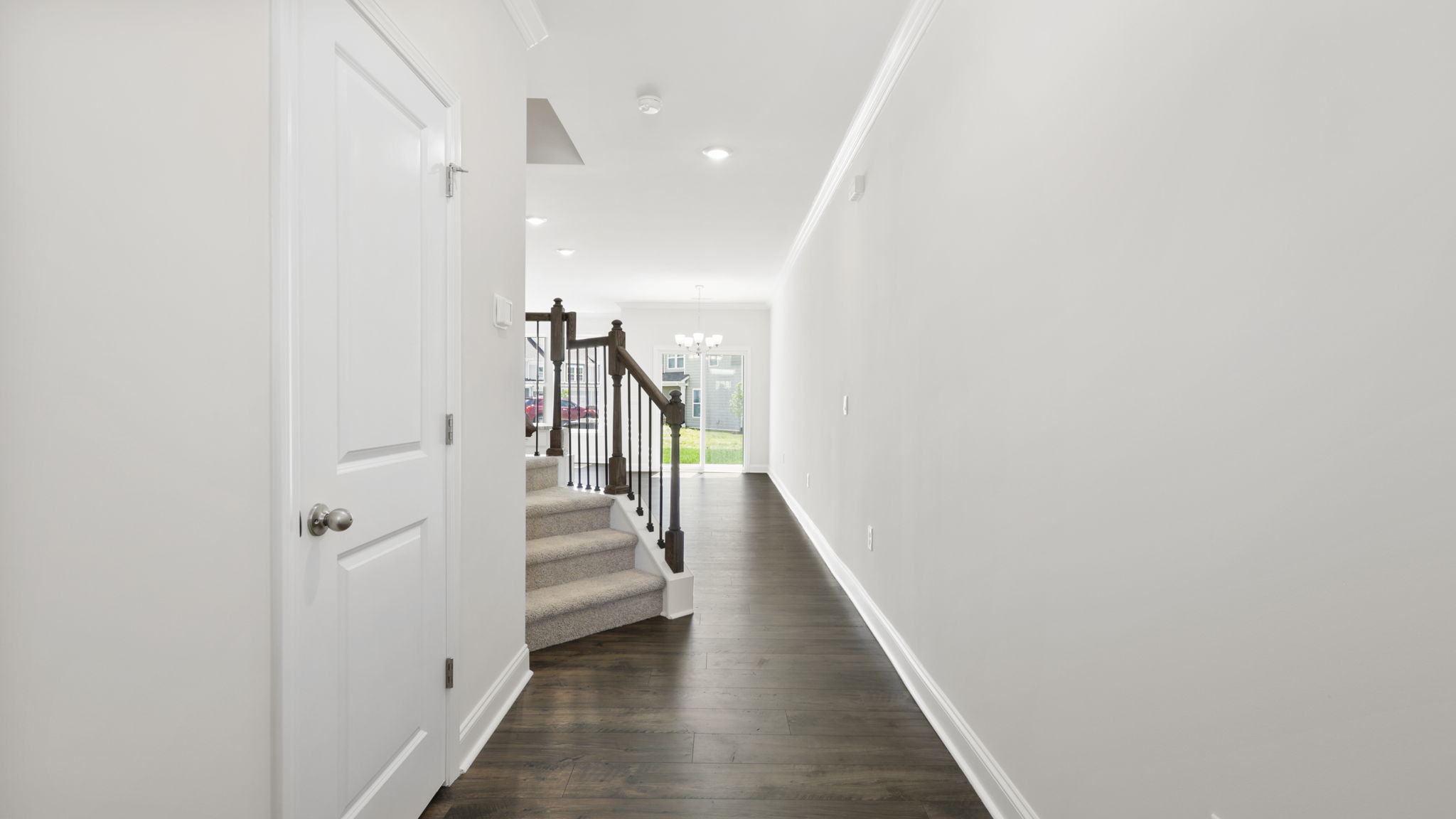 Front foyer with view of the stairs on left