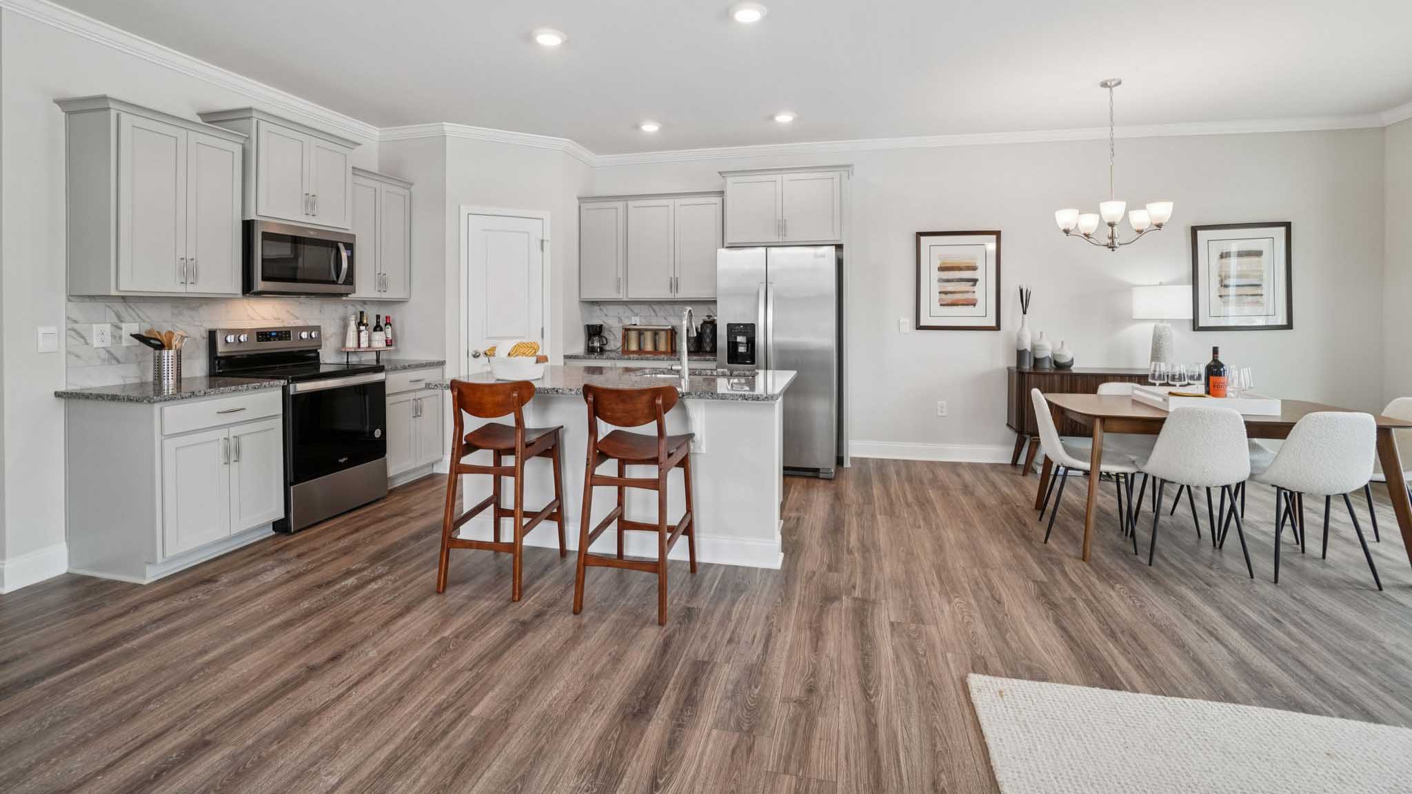 Open concept living space with large windows