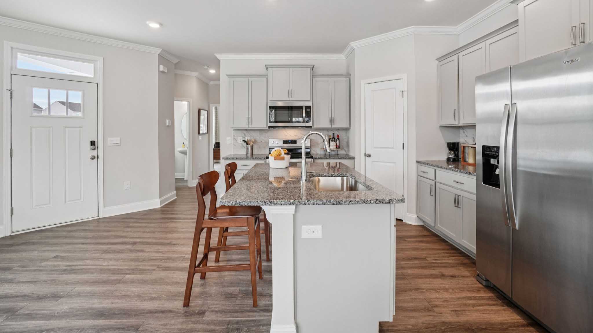 Kitchen with large island and stainless steel appliances