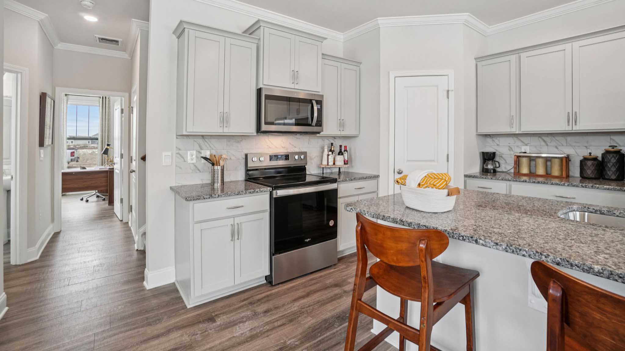 Kitchen with large island and stainless steel appliances
