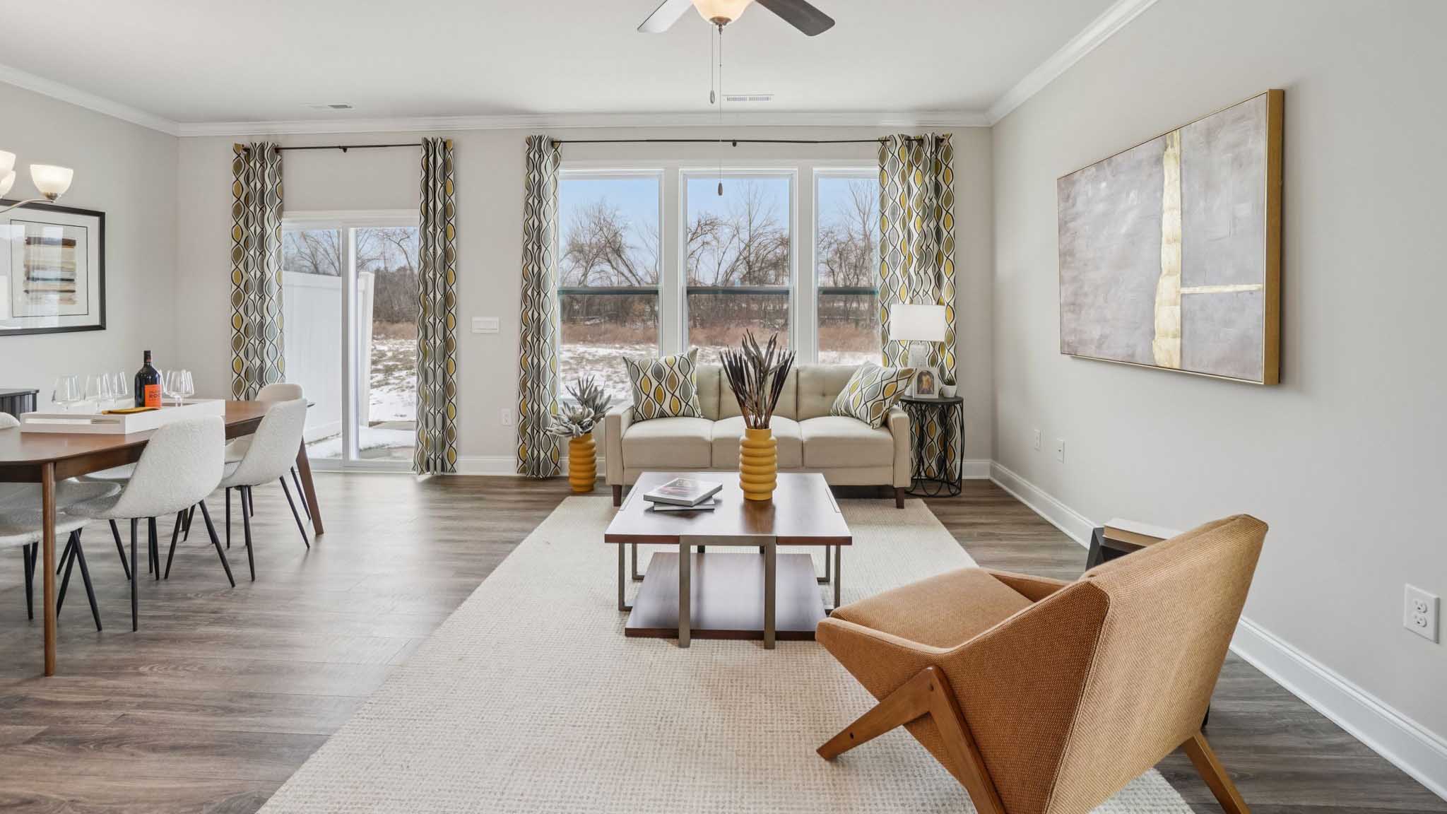 Open concept living space with large windows