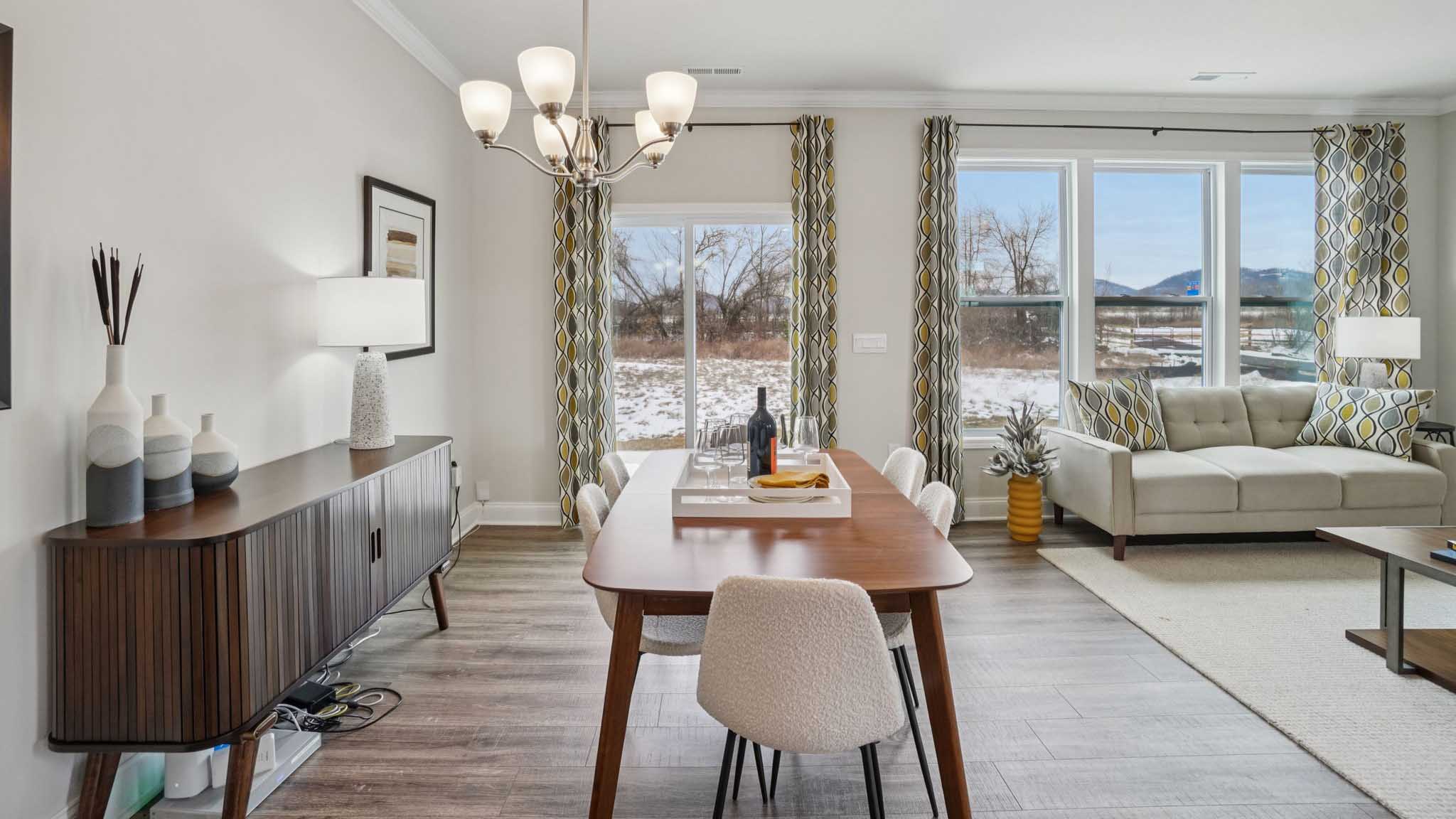 Open concept living space with large windows