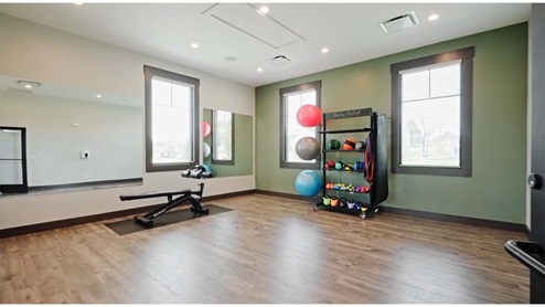 Another gym area with dedicated space for aerobic activities.