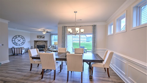 Dining area near kitchen, open near sliding glass doors