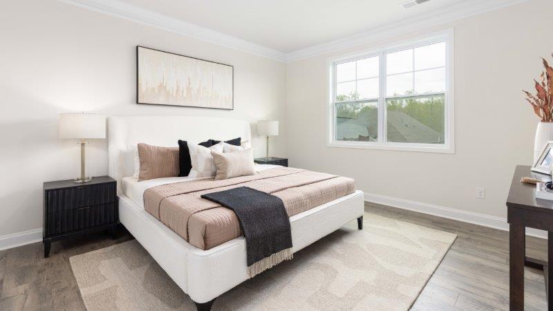 Arlington primary bedroom, carpeted with large window