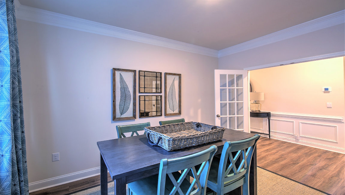 Dining room with vinyl flooring and french doors