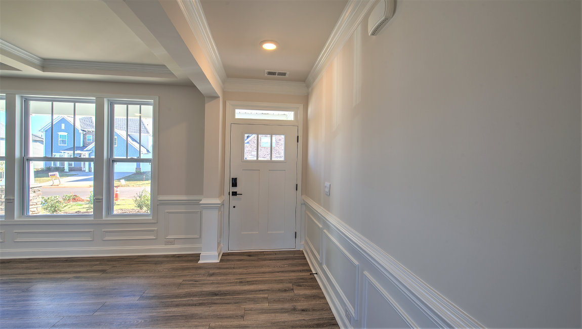 Welcoming foyer view of front door