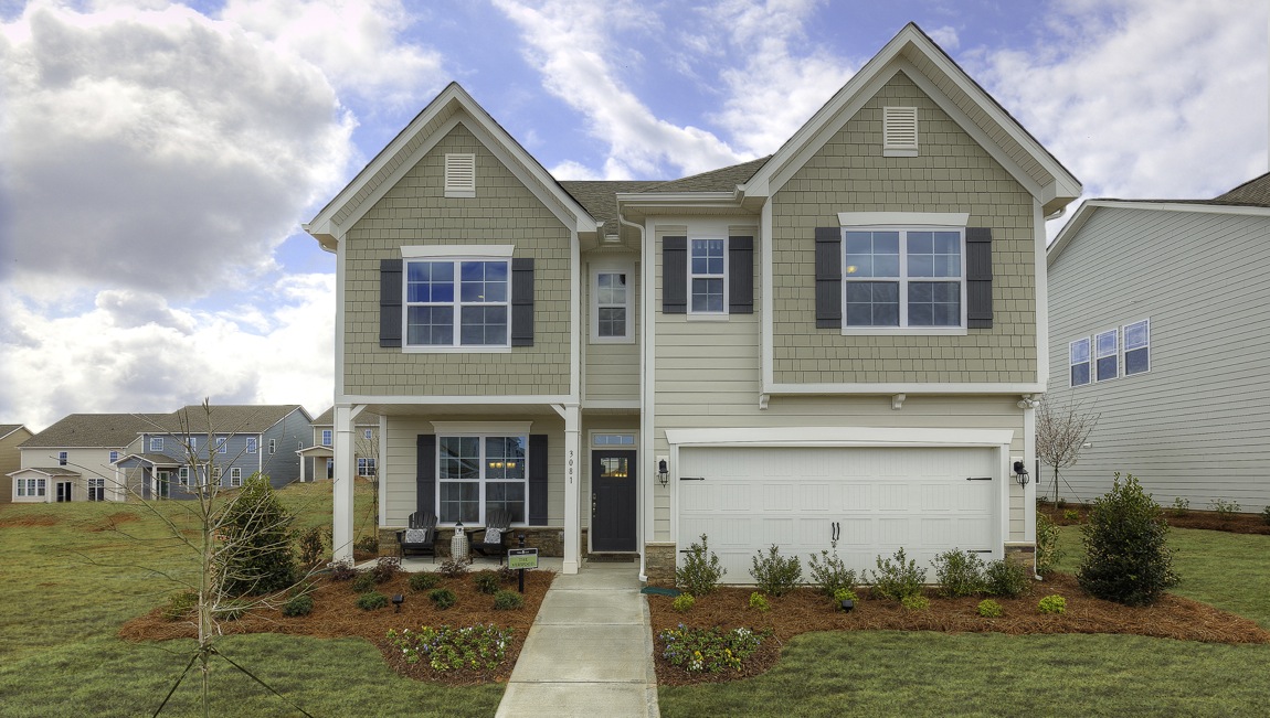 Verwood front exterior with siding and stone