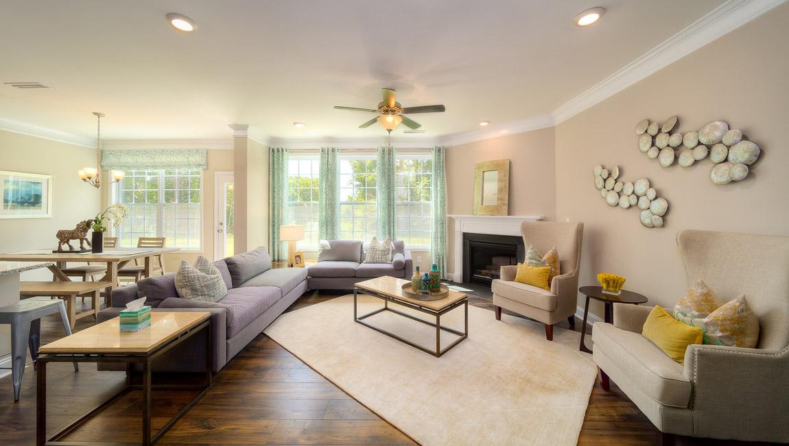 Family room with wood floors and fireplace