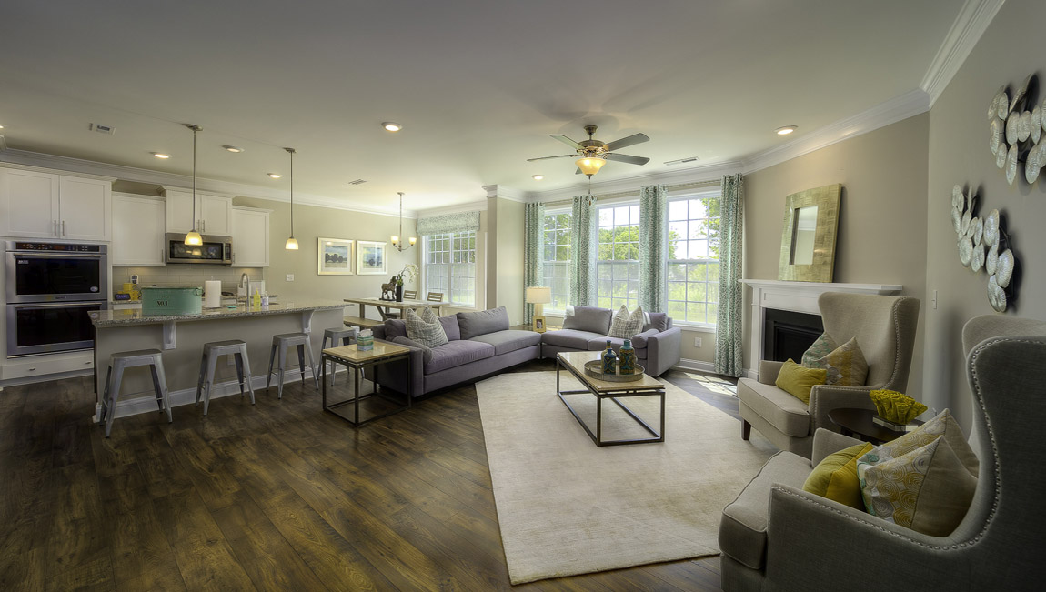 Family room with wood floors and fireplace