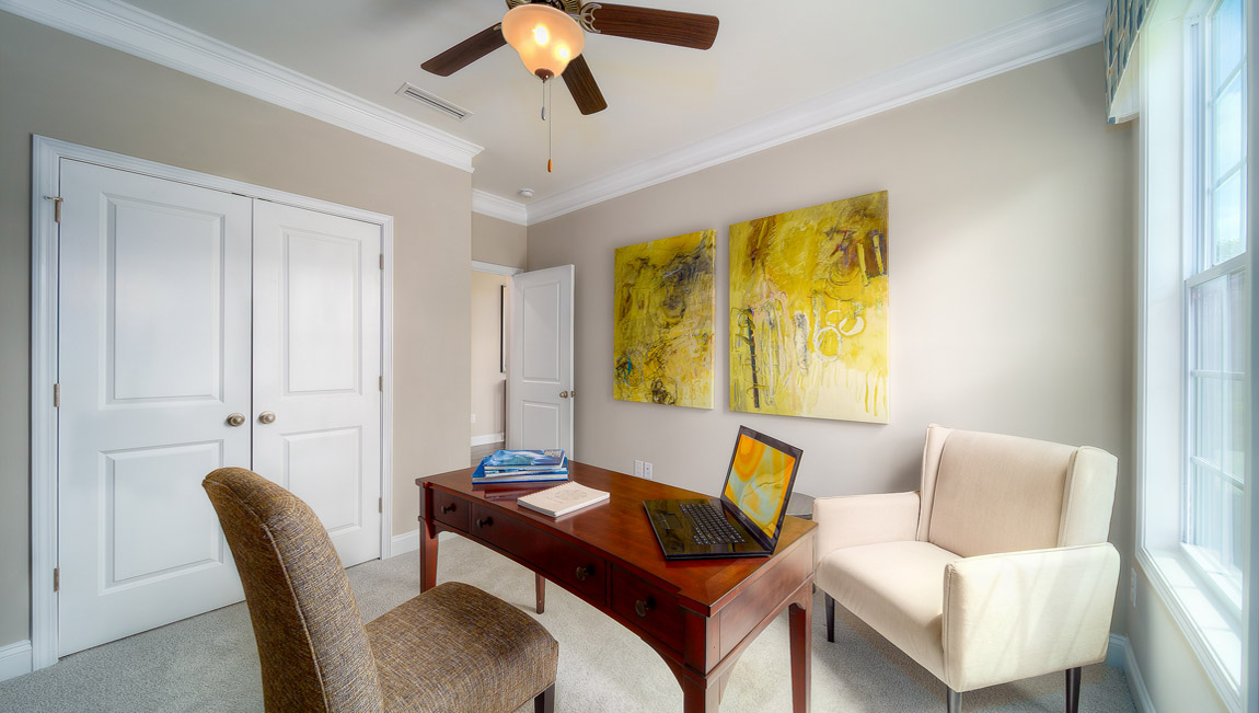 Carpeted bedroom with medium window