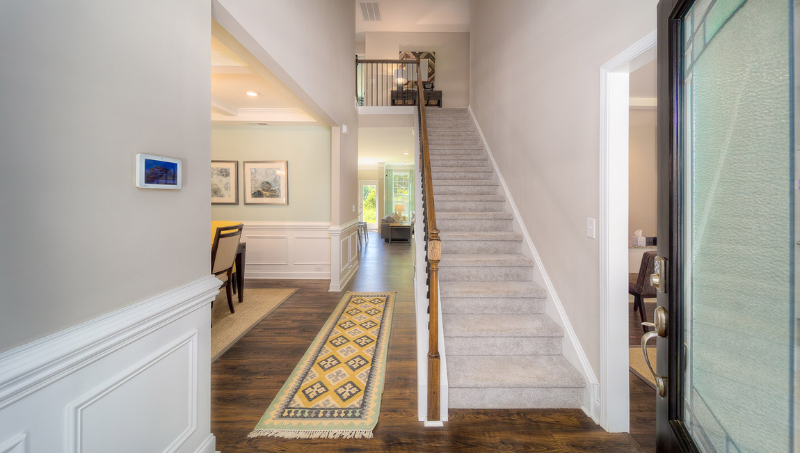 Welcoming foyer, view of drop zone and front door