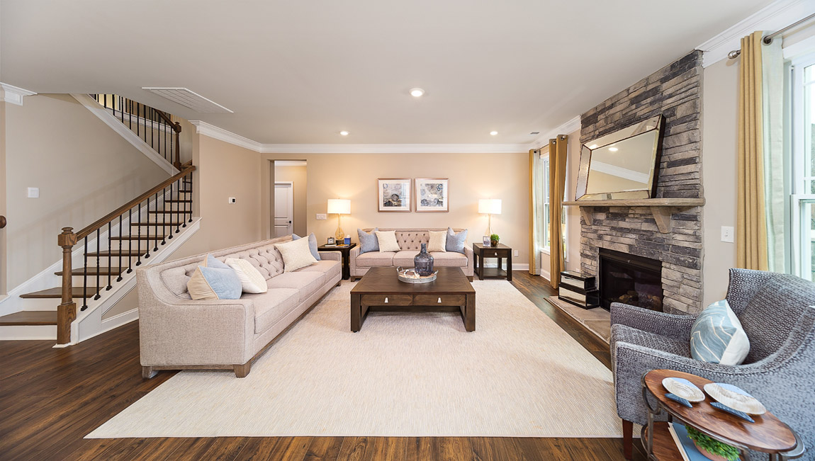Family room with fireplace, view from kitchen