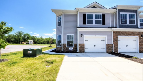 Townes at Stonecrest Carson model front exterior with brick and siding