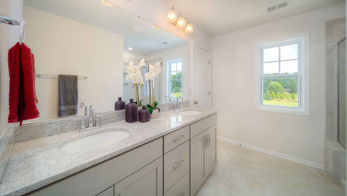 Primary bathroom with dual vanity