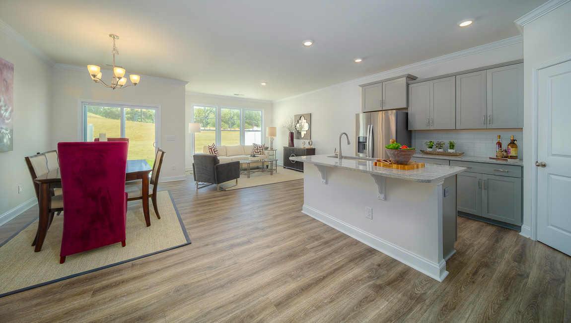 Open concept kitchen with stainless steel appliances
