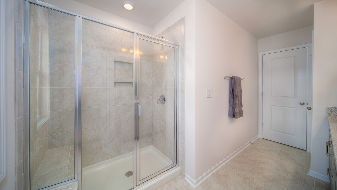 Primary bathroom with glass door shower